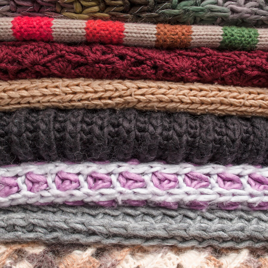 Pile of woolen clothes for winter